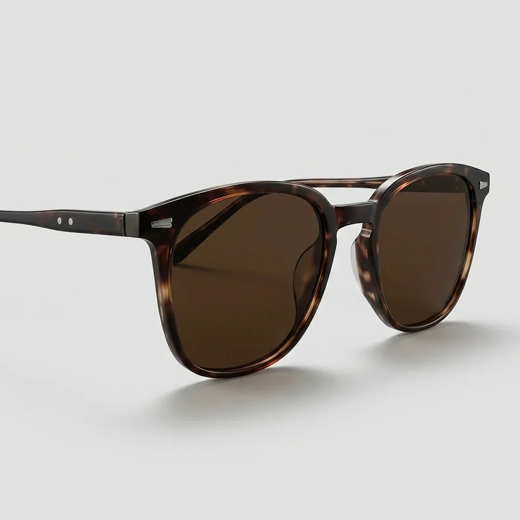 Plastic sunglasses with tinted lenses, riveted hinges, unisex fit