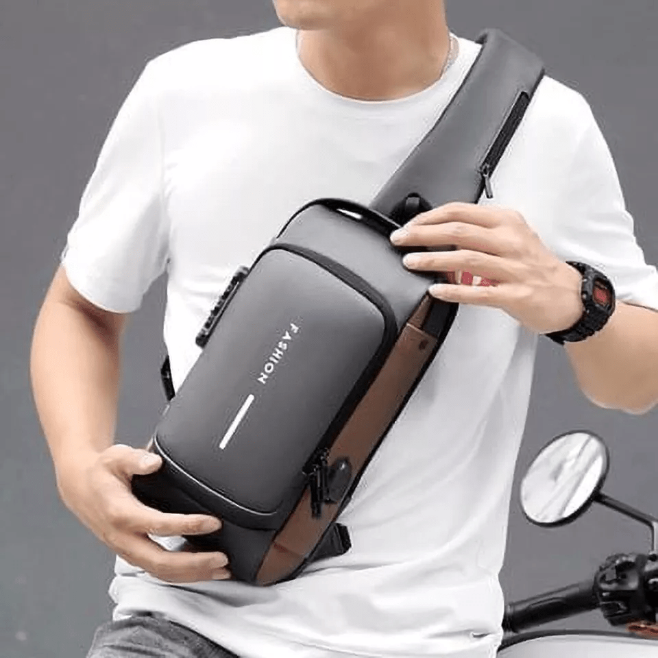 Anti - Diebstahl Crossbody - Tasche mit Zahlenschloss und USB - Ladeport Wasserabweisende Sling Bag mit Versteckten Reißverschlüssen - Bolania