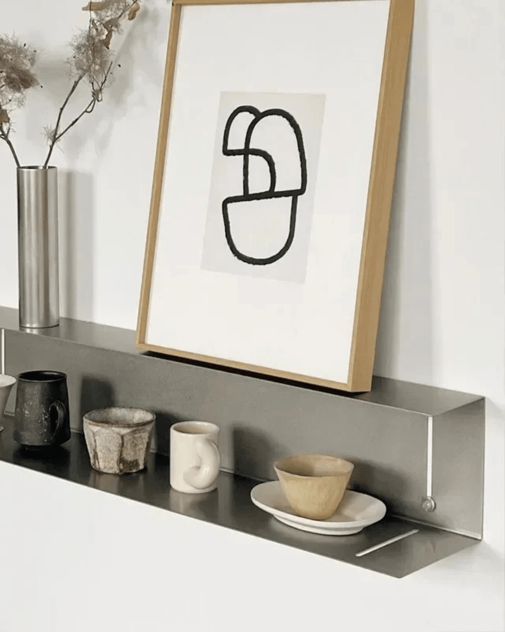 Calmara – Elegantes Wandregal aus Edelstahl - Bolania