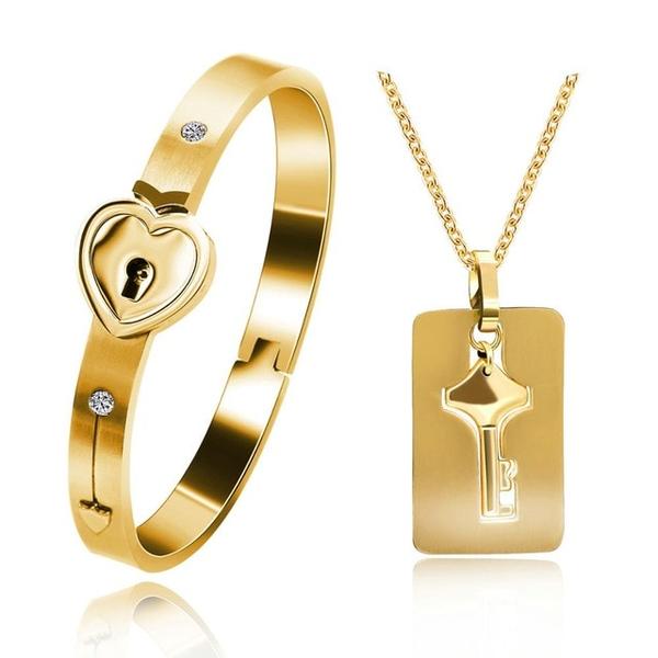 Couples Partner Jewelry Set Bracelet with Heart Lock and Necklace with Key Pendant Made of Stainless Steel, Silver-Colored